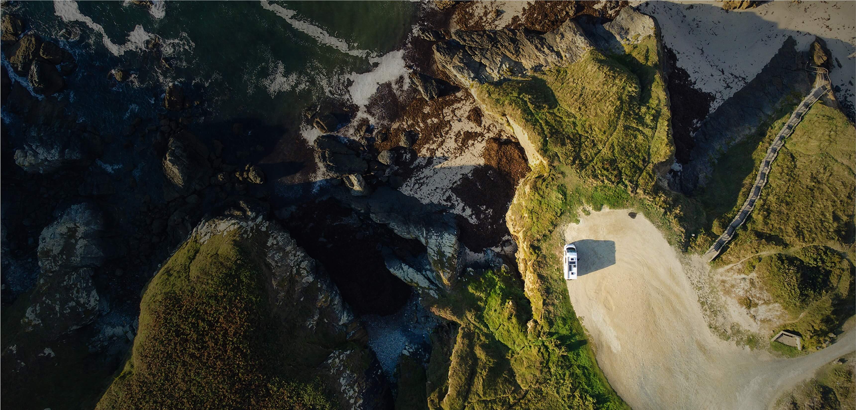 Aerial view of Mallorca landscape with campervan